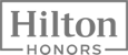 The image contains the Hilton Honors logo, featuring the words "Hilton Honors" in a framed design.